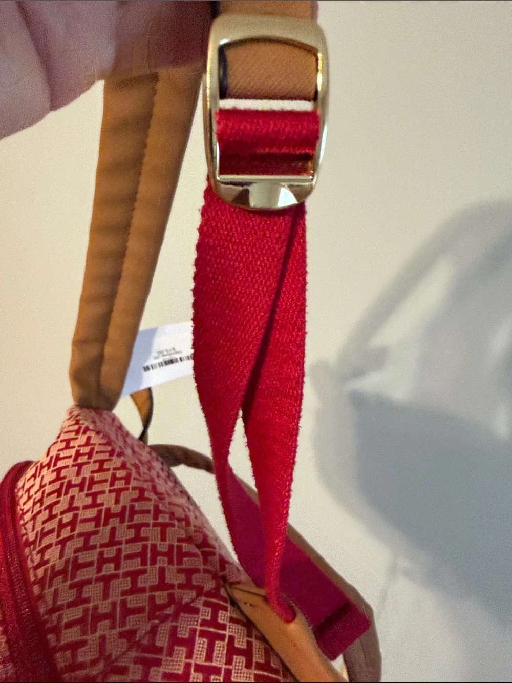 Tommy Hilfiger Red and White Monogram Backpack with Tan Trim.